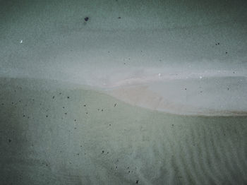 High angle view of empty road by sea