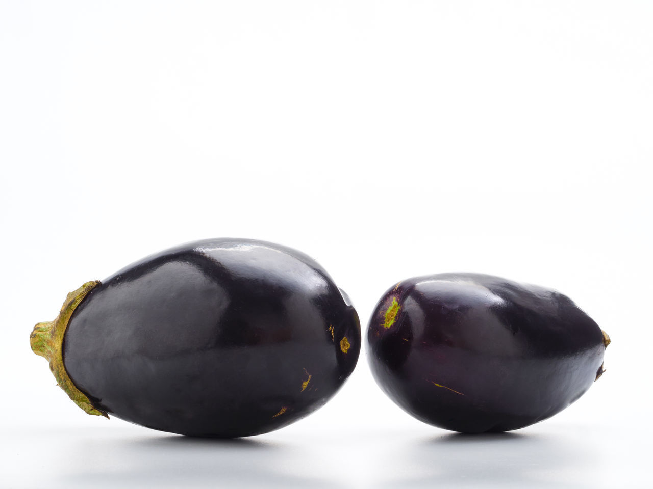 CLOSE-UP OF FRUIT ON WHITE BACKGROUND