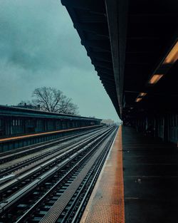 Railroad station platform against sky