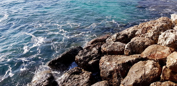 High angle view of rocks on beach