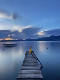 Pier over sea against sky