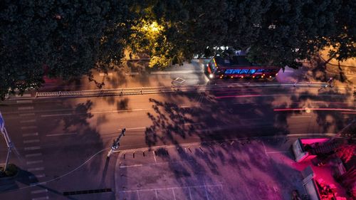 High angle view of illuminated street in city