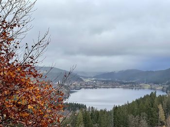 Scenic view of lake against sky during autumn