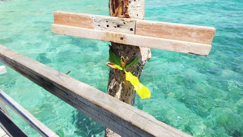 High angle view of wooden post in swimming pool