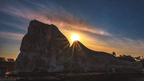 Scenic view of landscape against sky during sunset