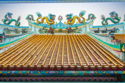 Low angle view of multi colored building roof