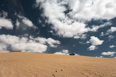 Scenic view of desert against sky