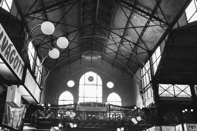 Low angle view of illuminated ceiling at railroad station