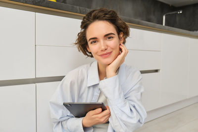 Young woman using mobile phone