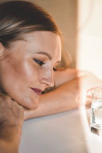 Close-up portrait of woman with eyes closed