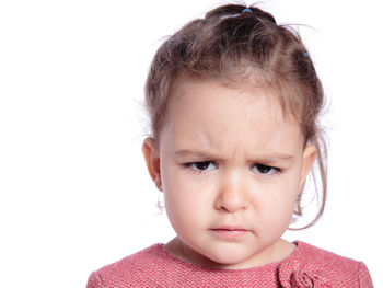 Portrait of boy against white background