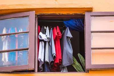 Clothes drying outside house