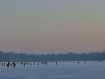 Scenic view of frozen lake against clear sky