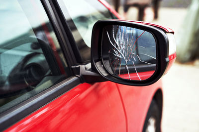 Reflection of car on side-view mirror