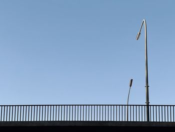 Low angle view of street light against sky