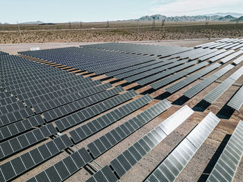 Renewable solar energy solar farm in the desert of southern nevada on a dry lake bed.