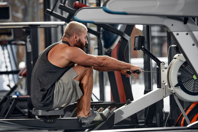 Man exercising in gym