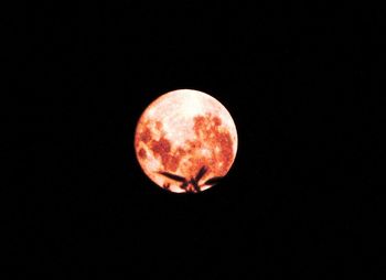 Close up of moon over black background