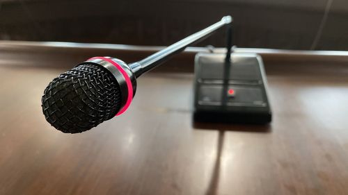 Close-up of microphone on table