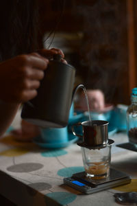 Close-up of coffee cup on table