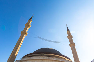 Large dome of a mosque with minarets