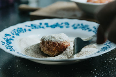 Close-up of dessert in plate on table