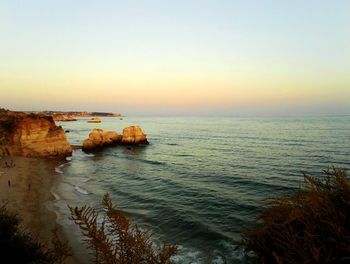 Scenic view of sea at sunset