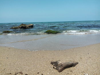 Scenic view of sea against clear sky