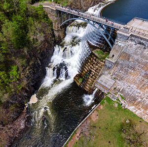 High angle view of waterfall by river