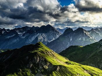 Scenic view of mountains against sky at night