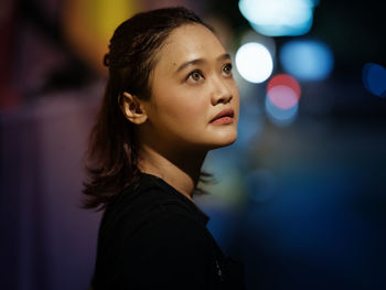 Night street portrait session with beautiful model