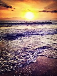 Scenic view of sea at sunset