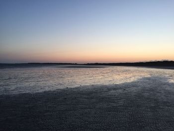 View of calm sea at sunset