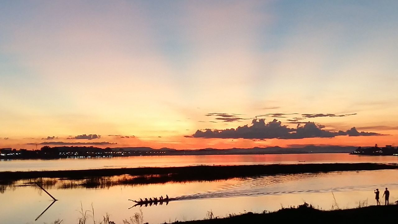 SUNSET OVER CALM LAKE