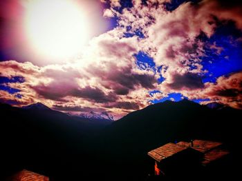 Low angle view of cloudy sky at sunset