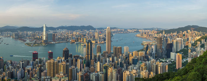 Panoramic view of city buildings against sky