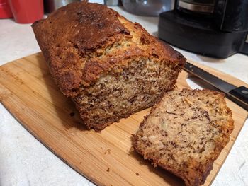 High angle view of bread on cutting board