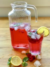 Glass of drink on table