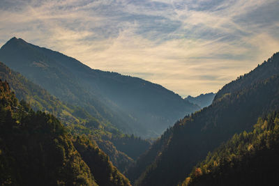 Scenic view of mountains against sky during sunset