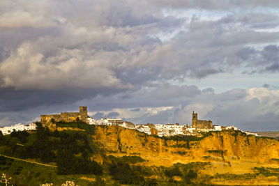 Historic building against cloudy sky