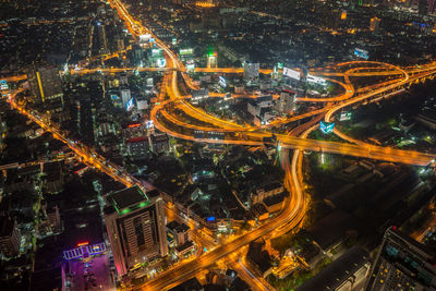 High angle view of illuminated city at night