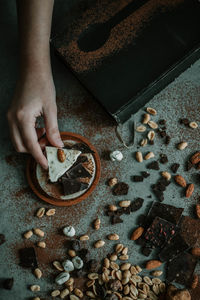 High angle view of person holding nuts