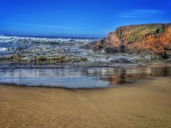 Scenic view of sea against clear sky