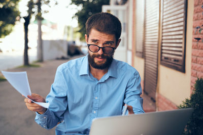 Young man using mobile phone