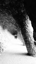 Man walking in tunnel