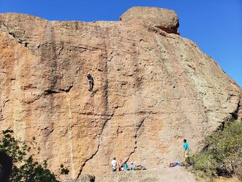 Group of people on rock