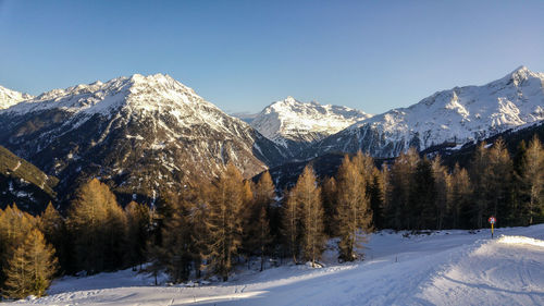 Snow covered mountain against sky