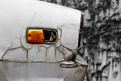 Close-up of vintage car on wall