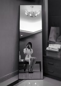 Woman sitting at home