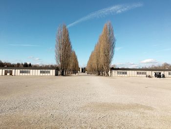 Built structure on field against sky